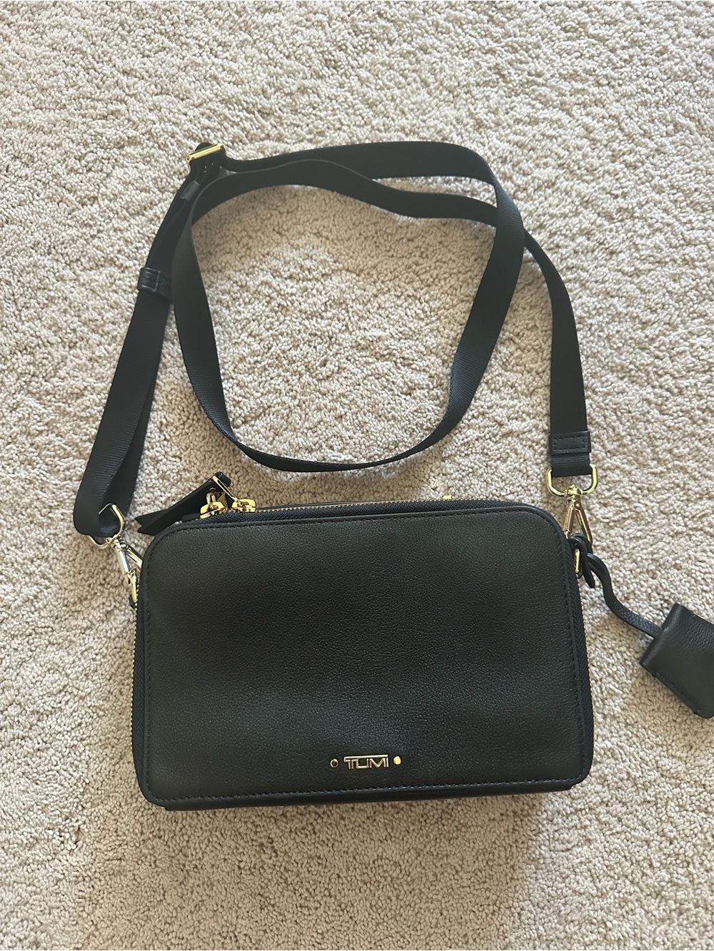 TUMI Voyager Black Leather Crossbody with Gold Hardware